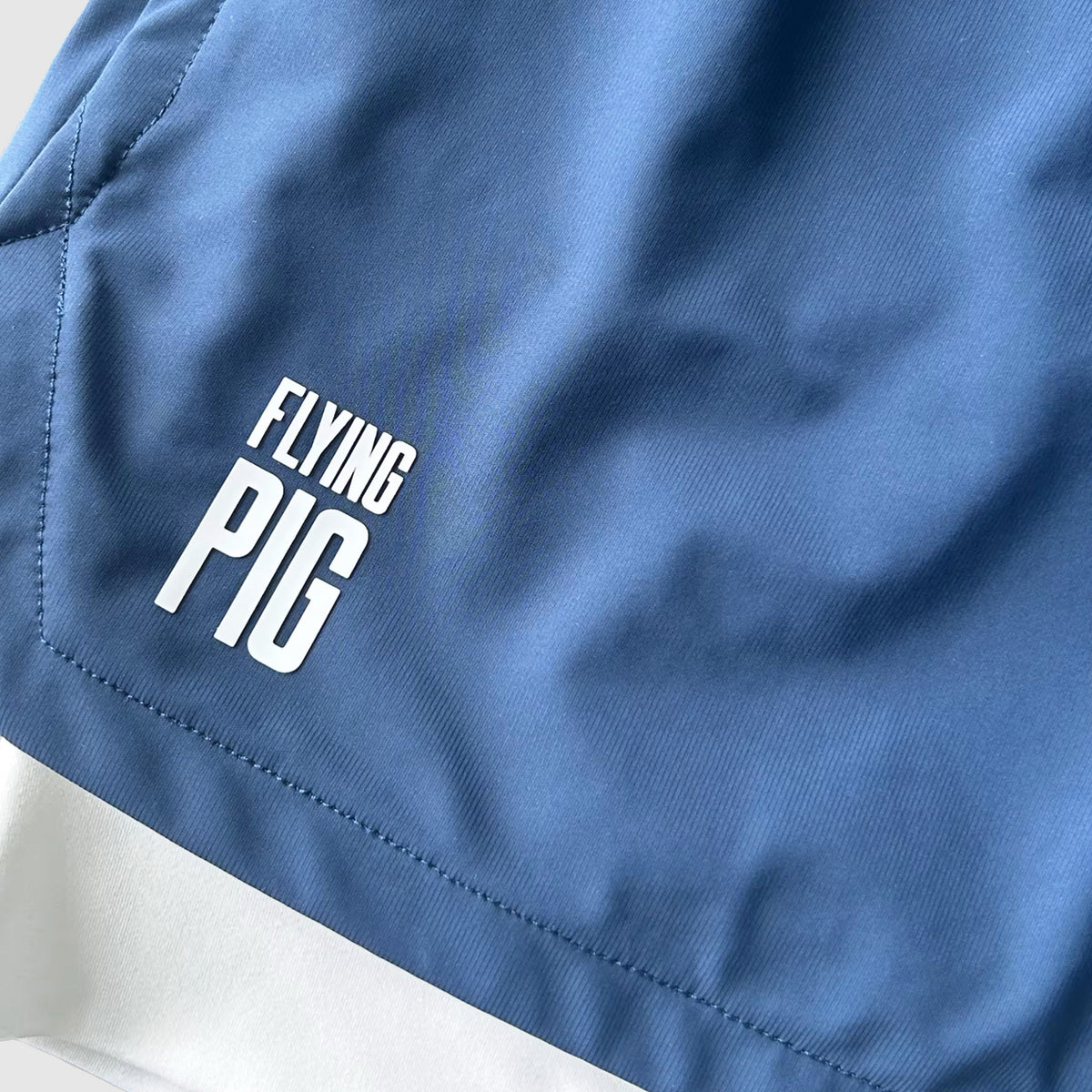 Fly sports shorts with blue mesh